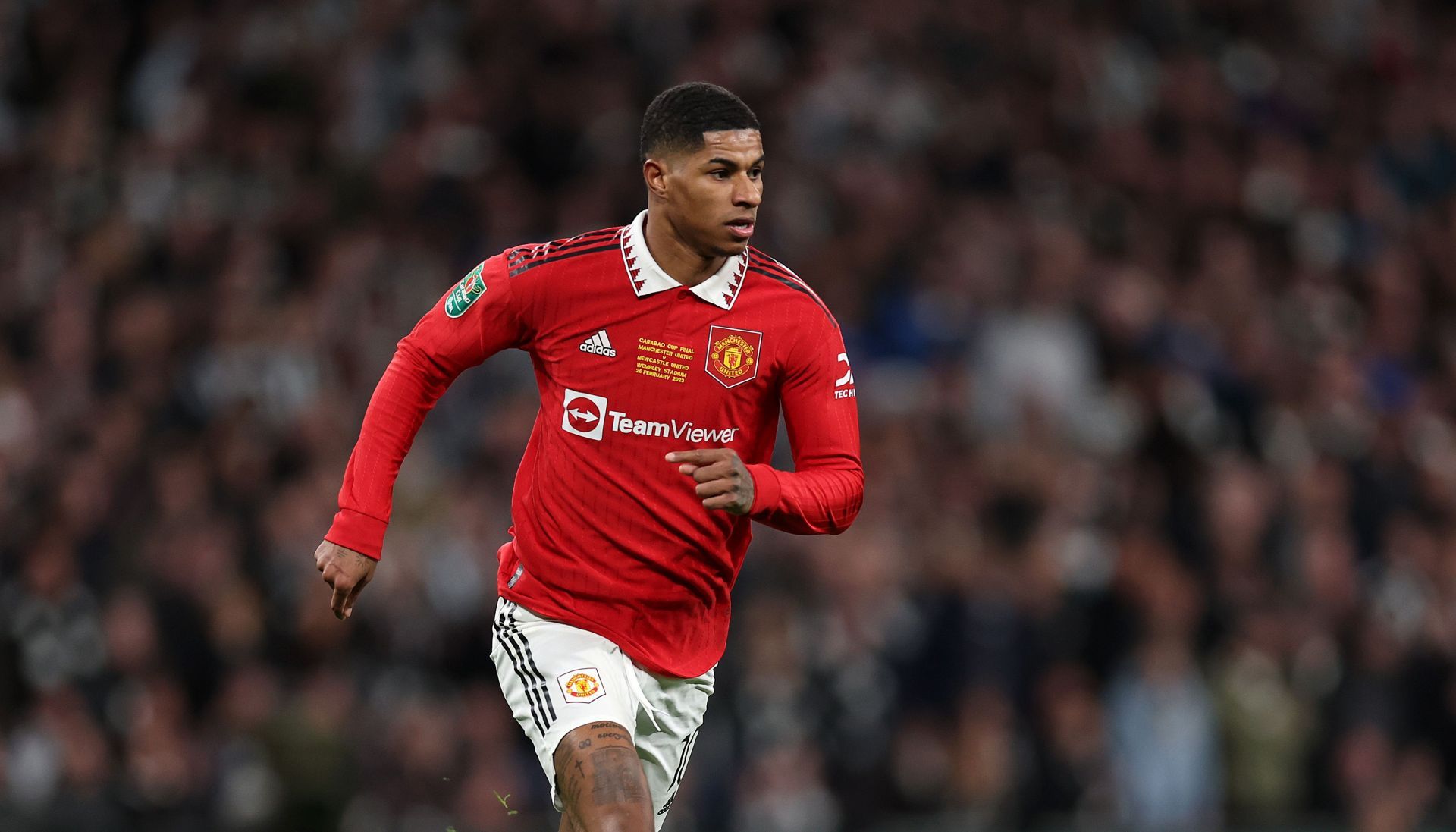 Marcus Rashford in action against Newcastle United - Carabao Cup Final