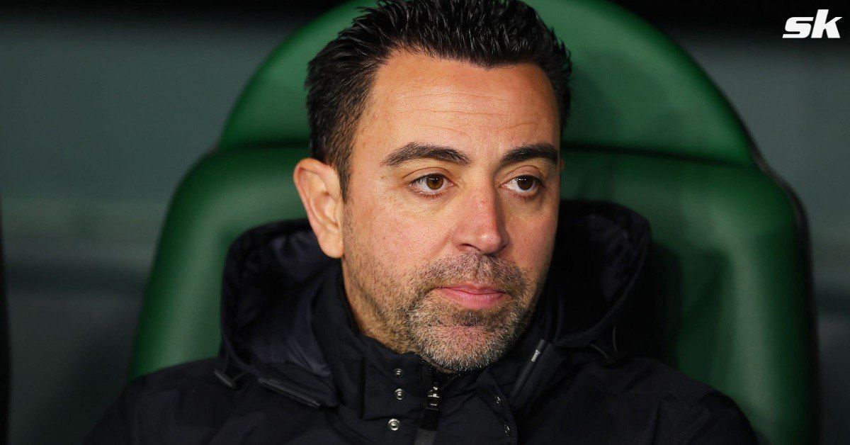 Barcelona coach Xavi looks on during a game