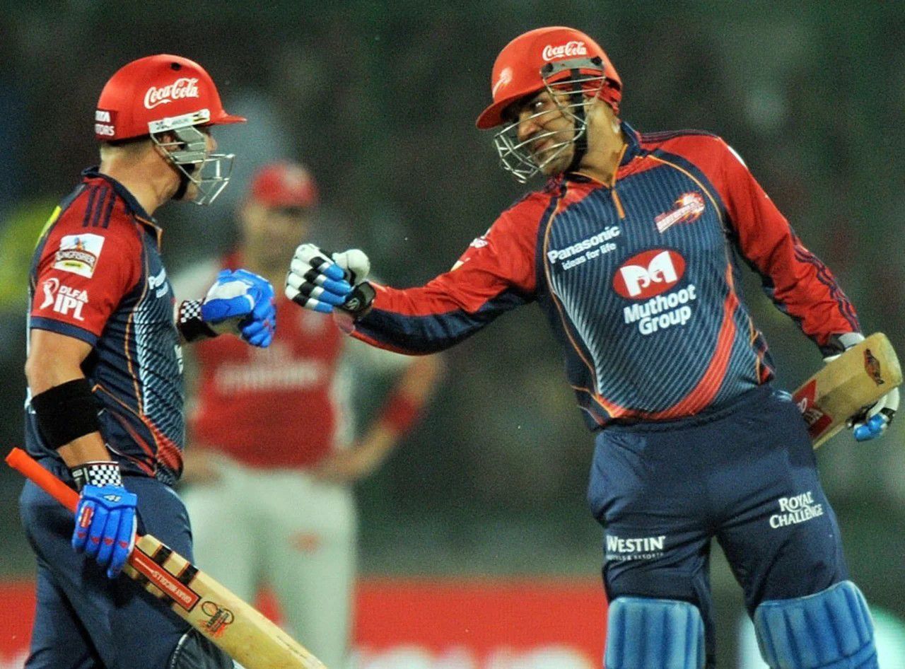 David Warner (L) and Virender Sehwag enjoying a century partnership [IPLT20]