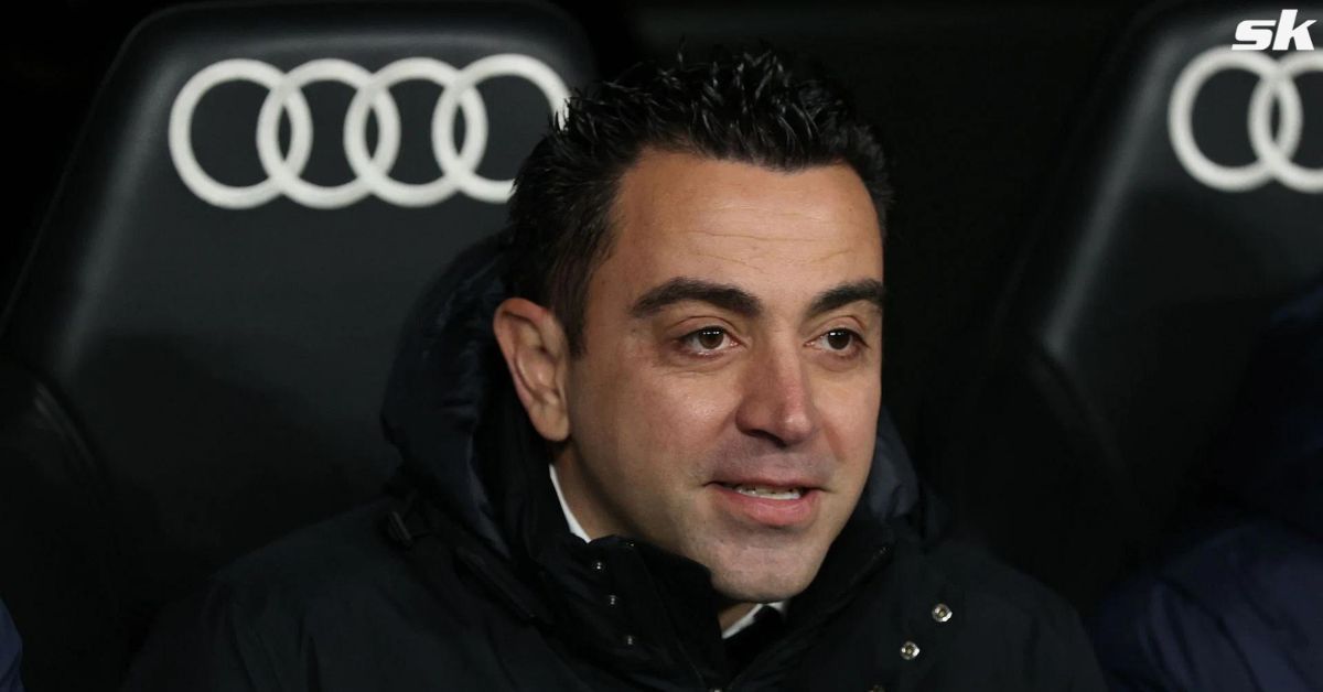 Barcelona manager Xavi Hernandez looks on.