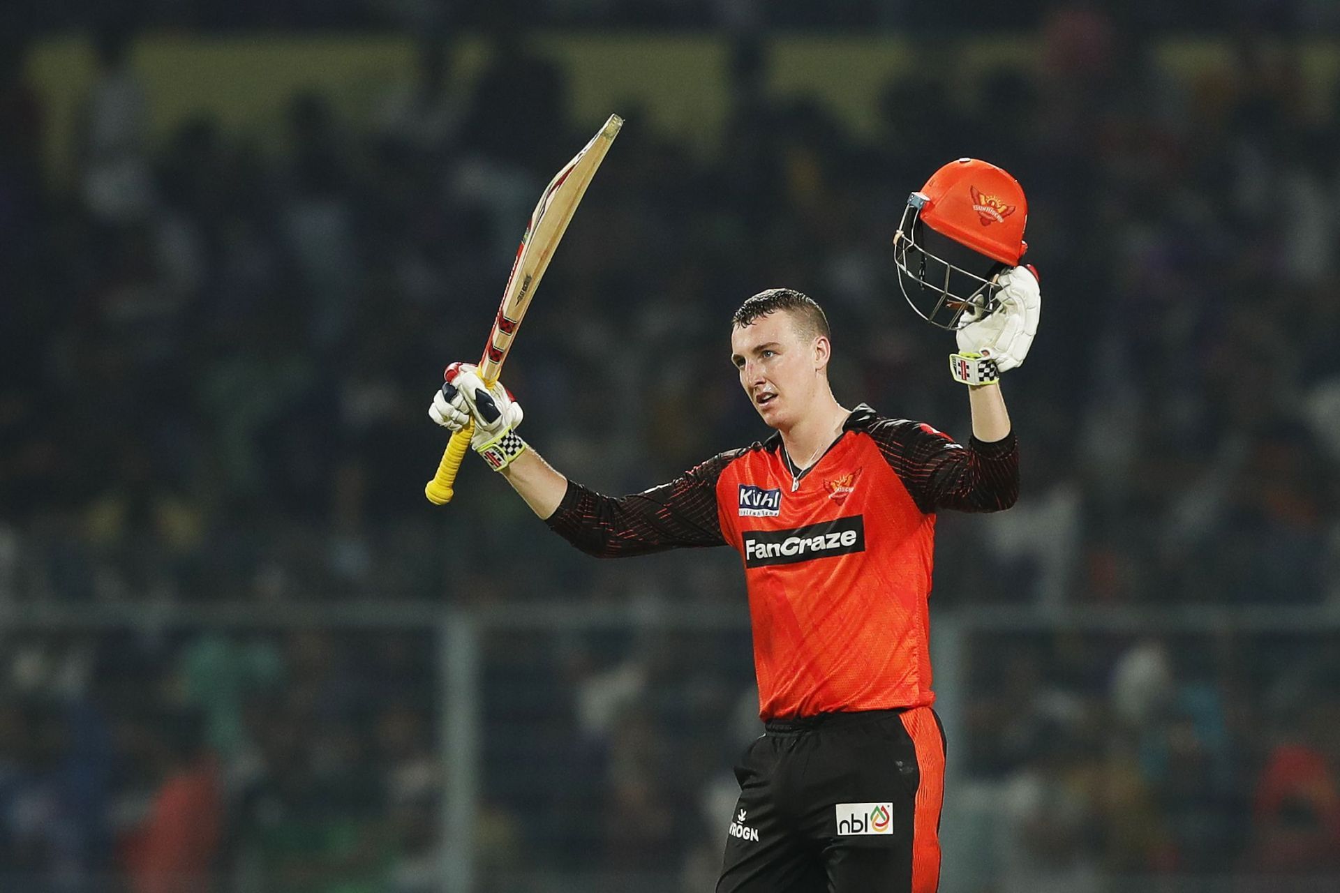 Harry Brook raises his bat after his hundred. (Image Credits: Twitter)