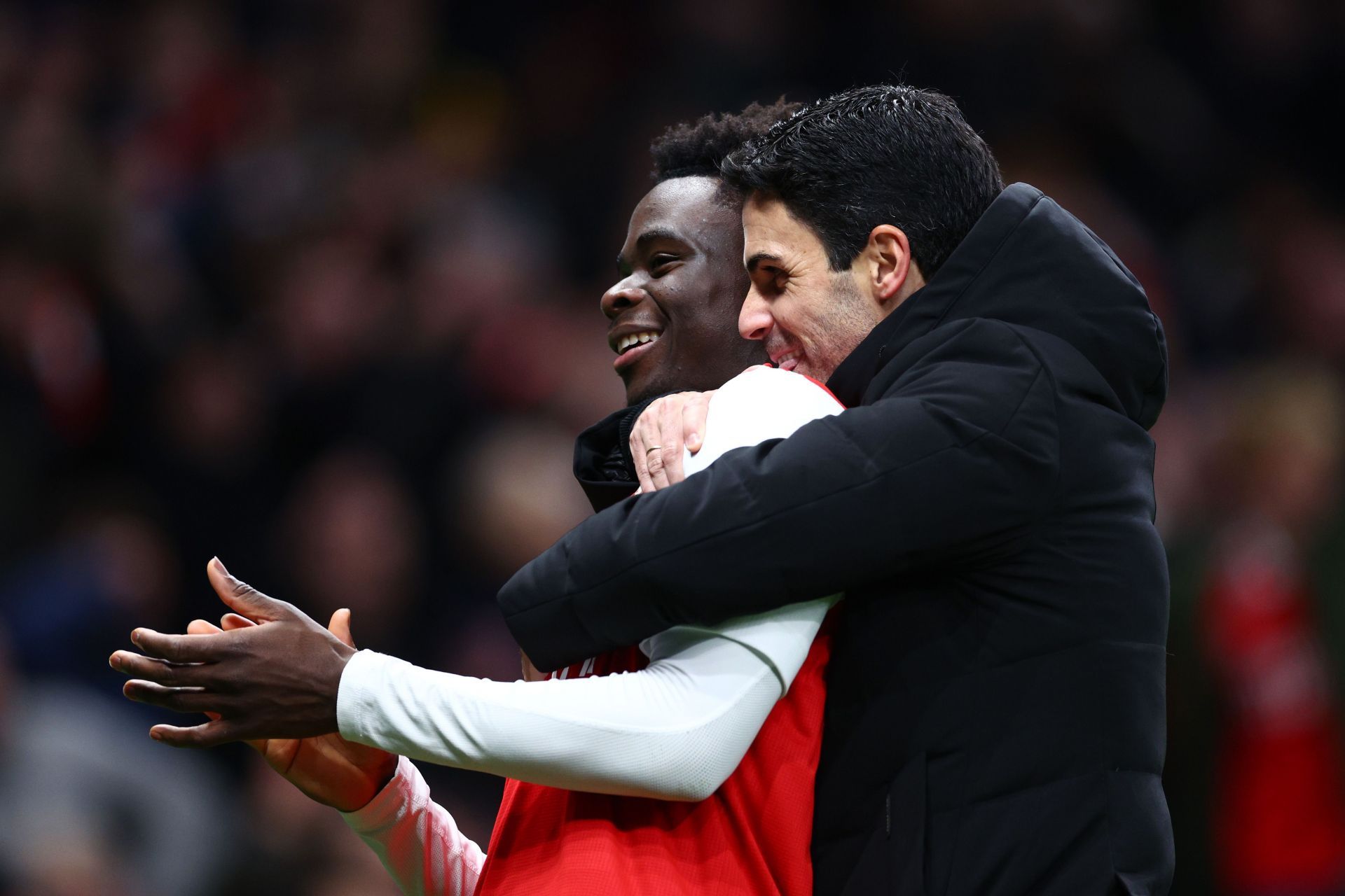 Mikel Arteta (right) has had a huge impact on Bukayo Saka&#039;s evolution.