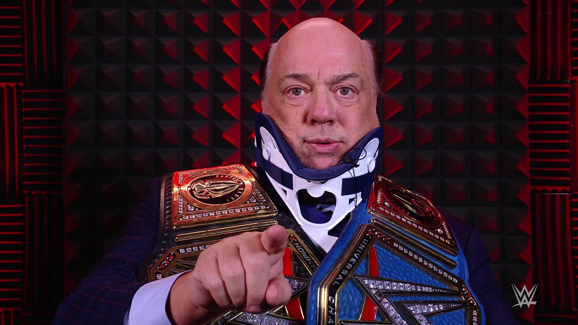 Paul Heyman, with both world titles