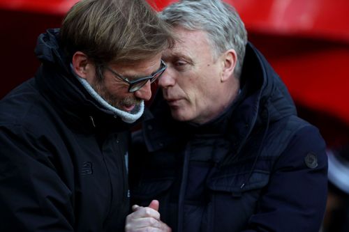 Jurgen Klopp (left) praises David Moyes (right).