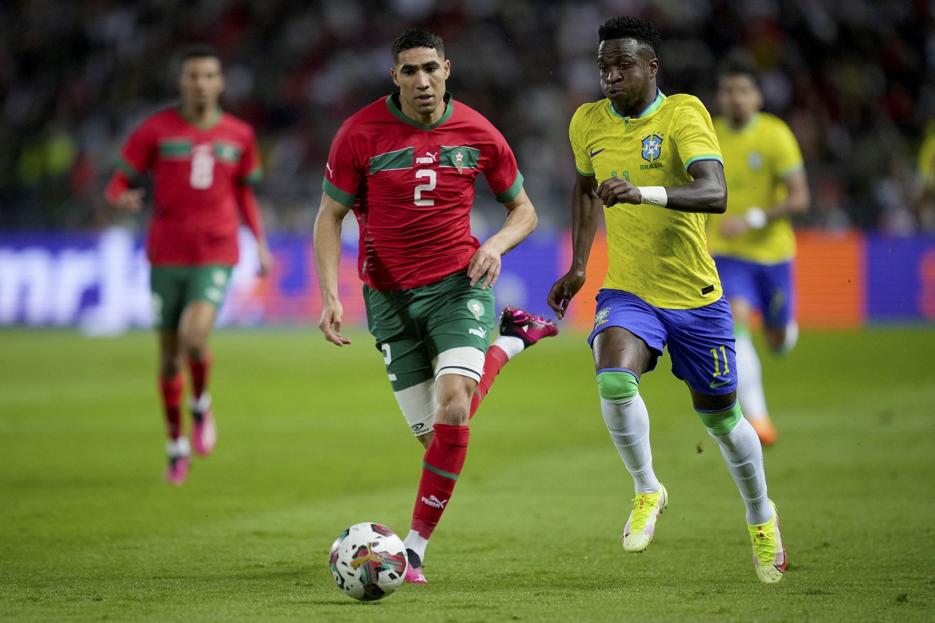 Achraf Hakimi (left) has admirers in the Premier League.