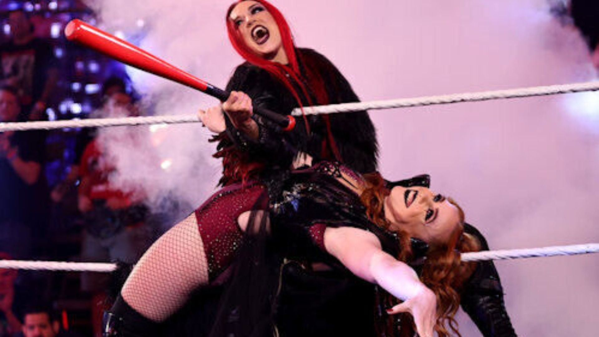 Alba Fyre and Isla Dawn pose during their in-ring entrance.