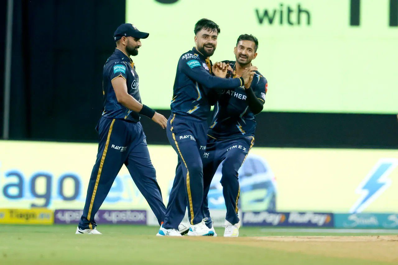 Rashid Khan celebrating with his GT teammates [IPLT20]