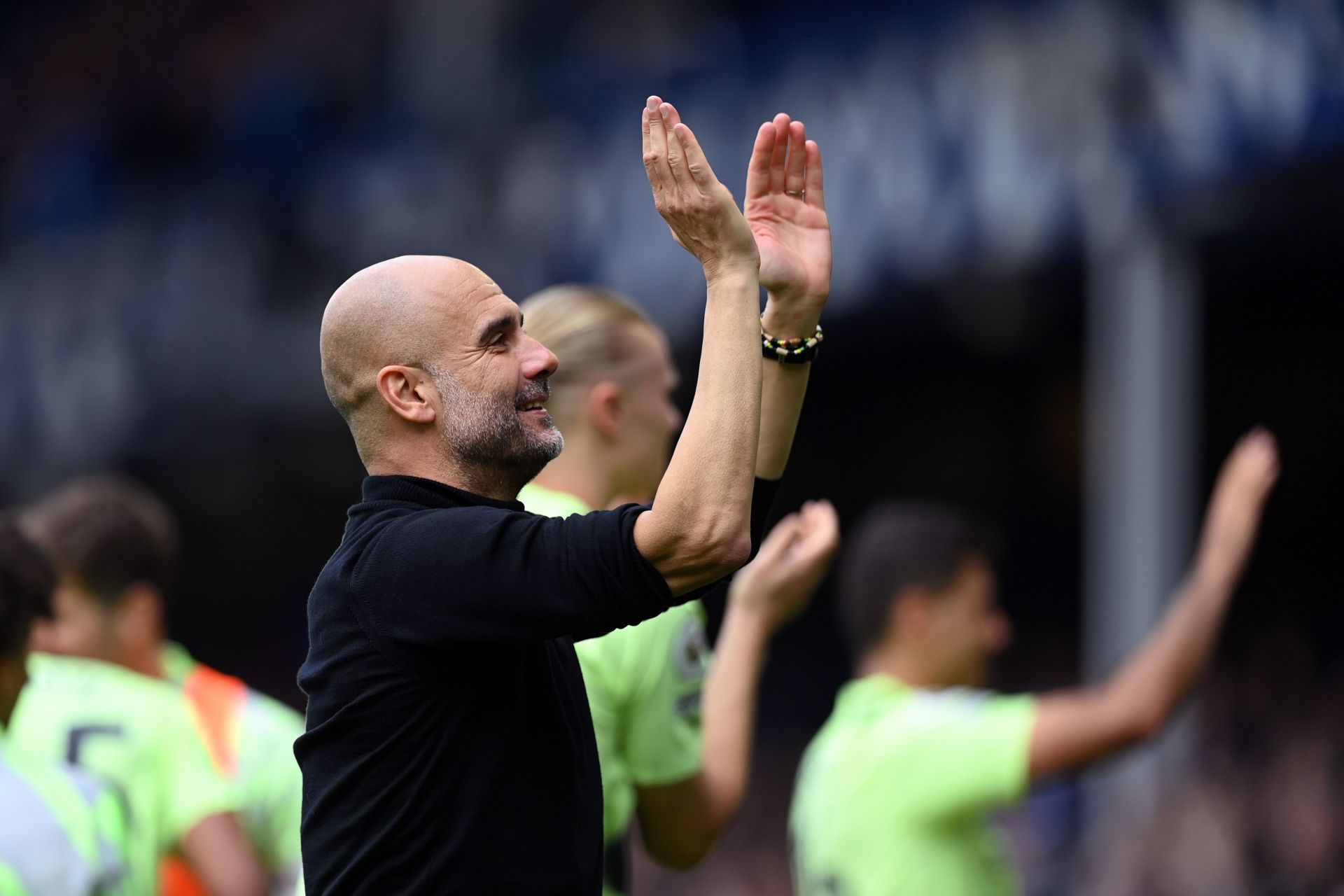 Guardiola celebrates City&#039;s victory against Everton.