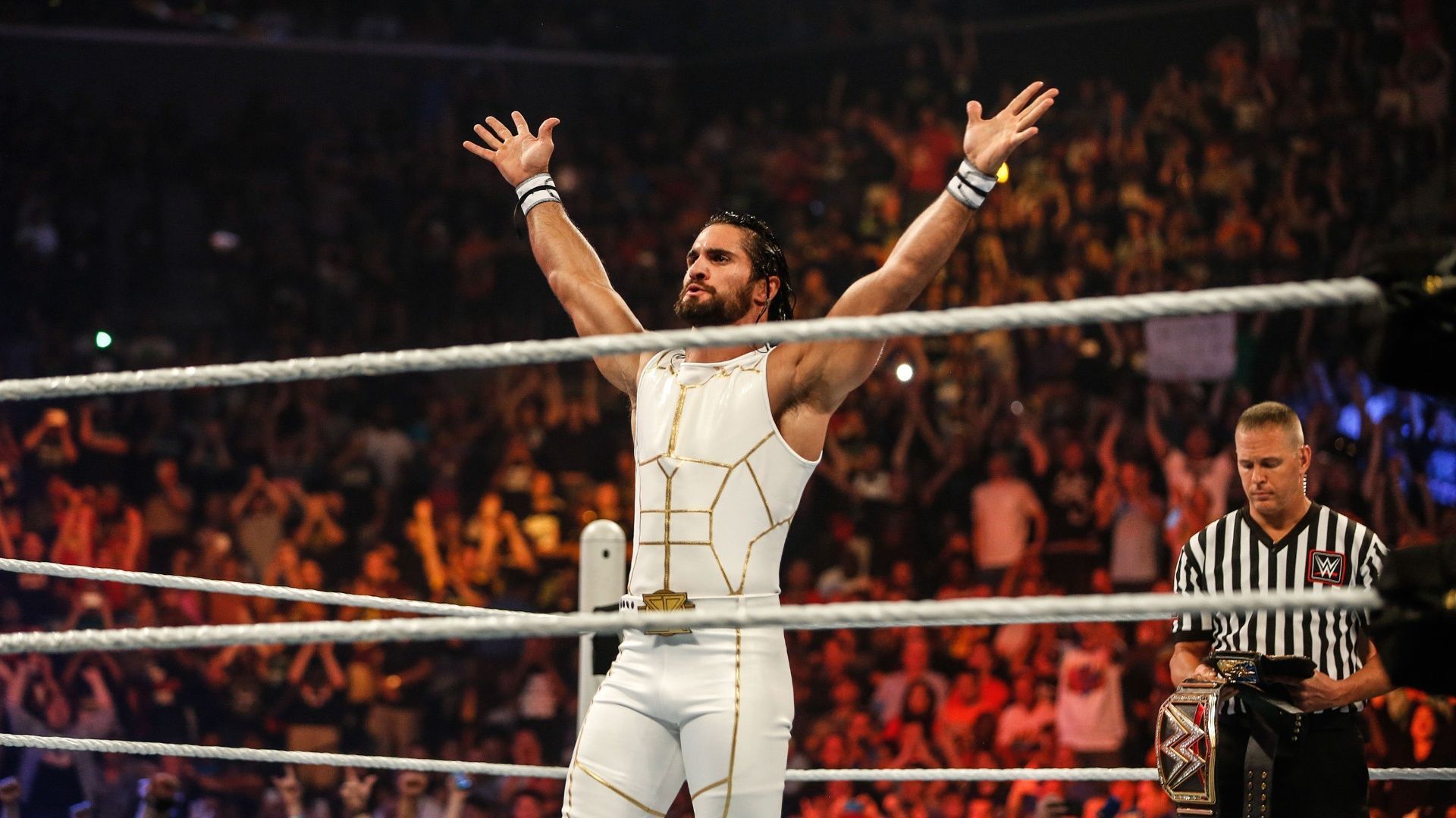 Seth Rollins poses in the ring at WWE Night of Champions 2015.