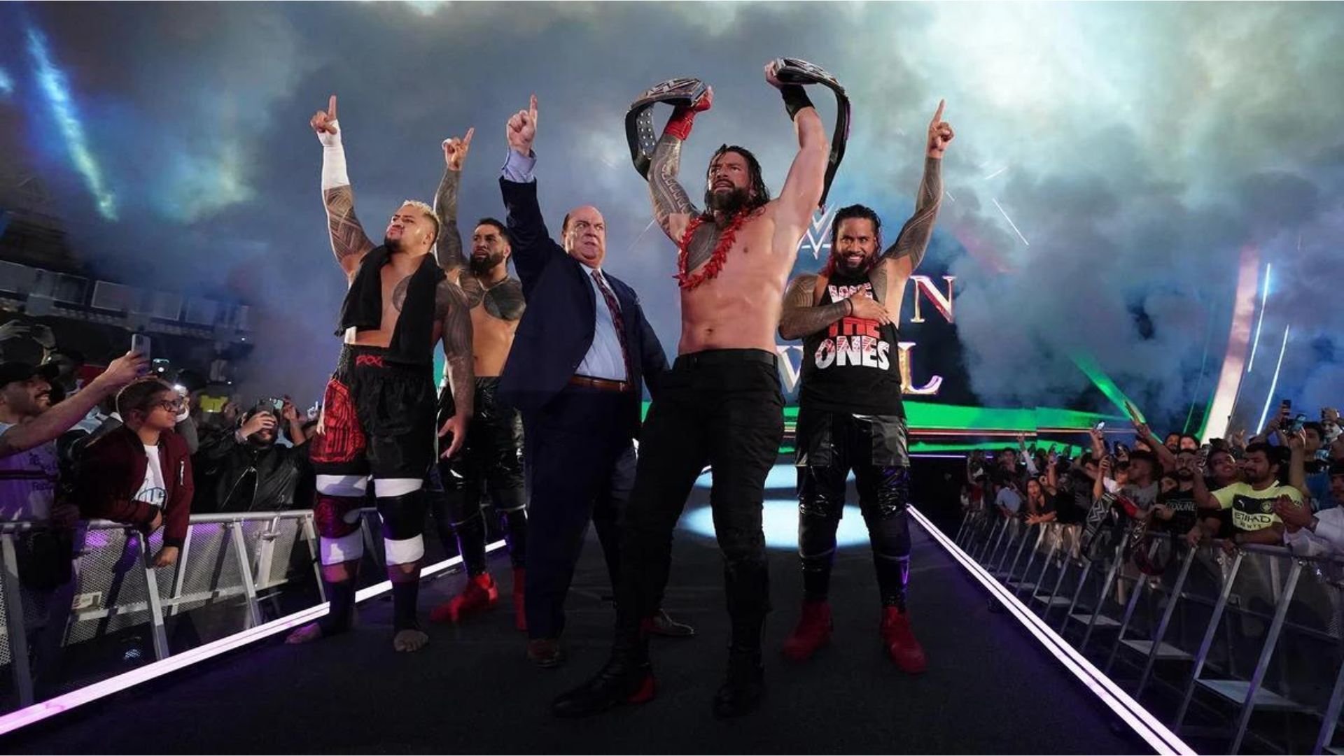 The Bloodline celebrates at the 2022 Crown Jewel in Saudi Arabia.