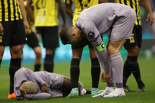 Ronaldo checks on Talisca after the latter suffered a minor blow