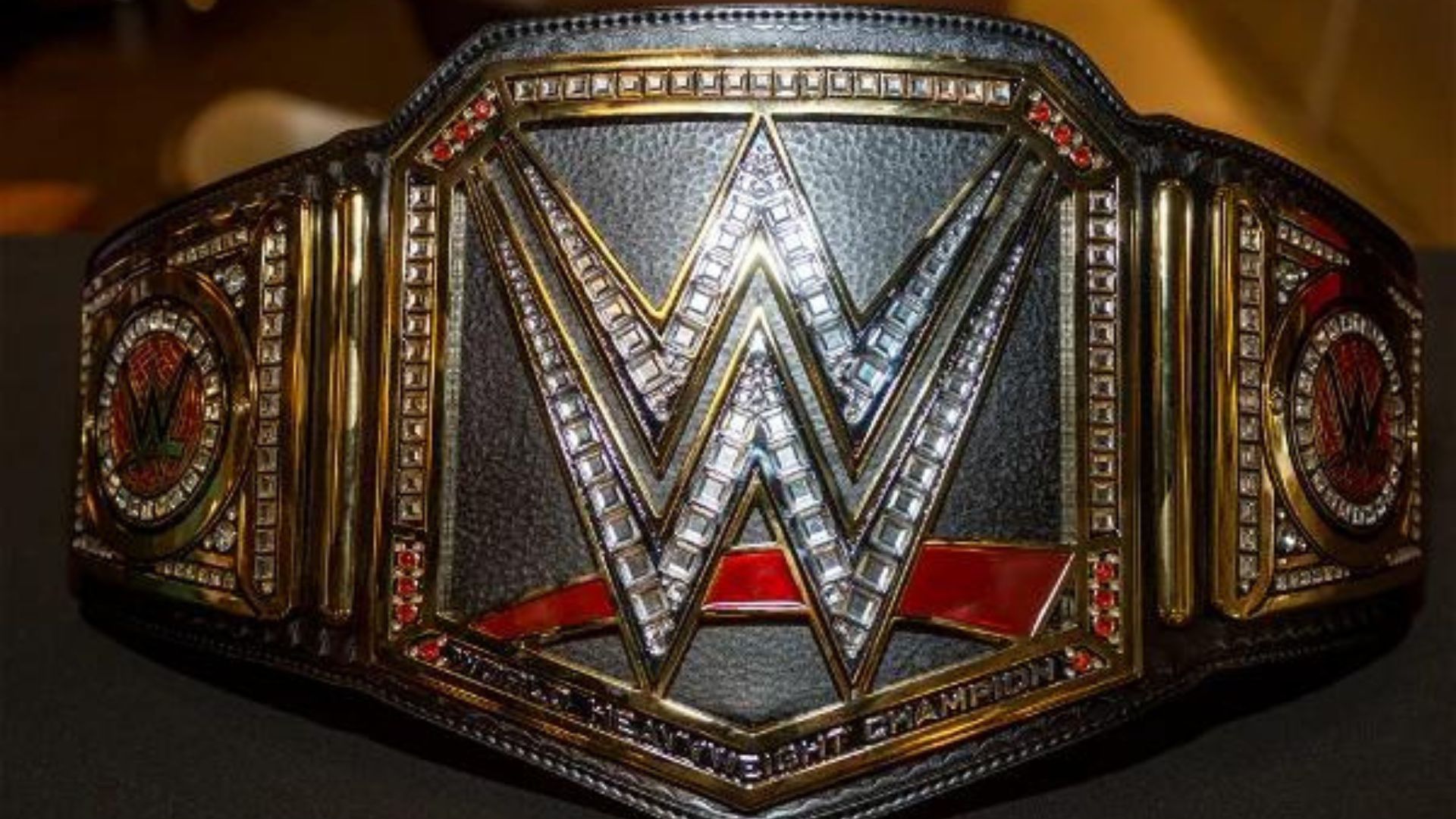 The WWE Championship belt is merged with the Universal Championship belt.