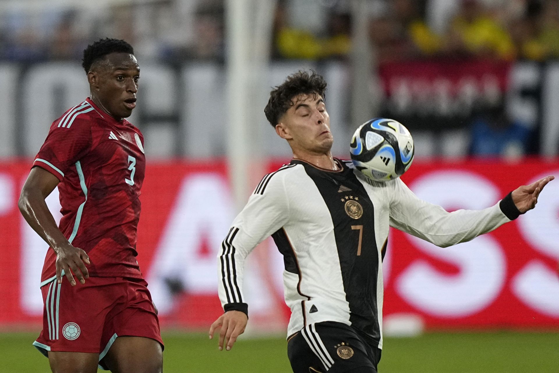 Kai Havertz (right) has arrived at the Emirates this week.