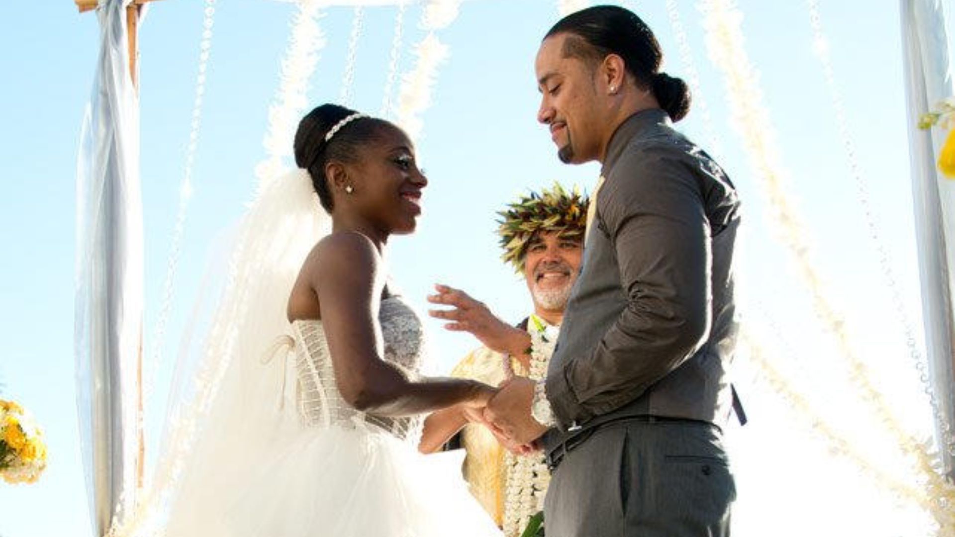 Naomi and Jimmy Uso at their wedding. Image Credits: wwe.com 