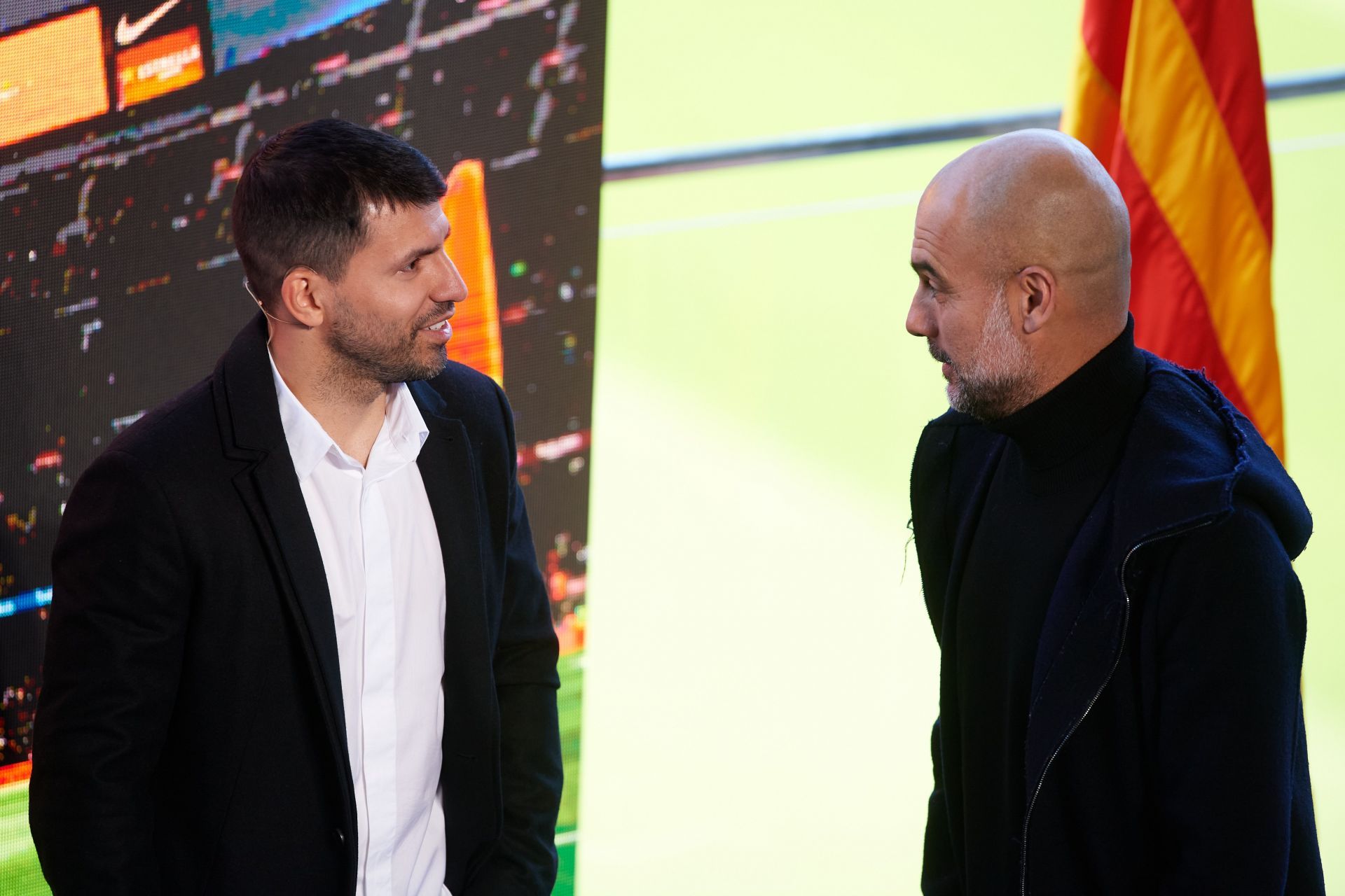 Aguero and Guardiola (right) joked after the Champions League final.