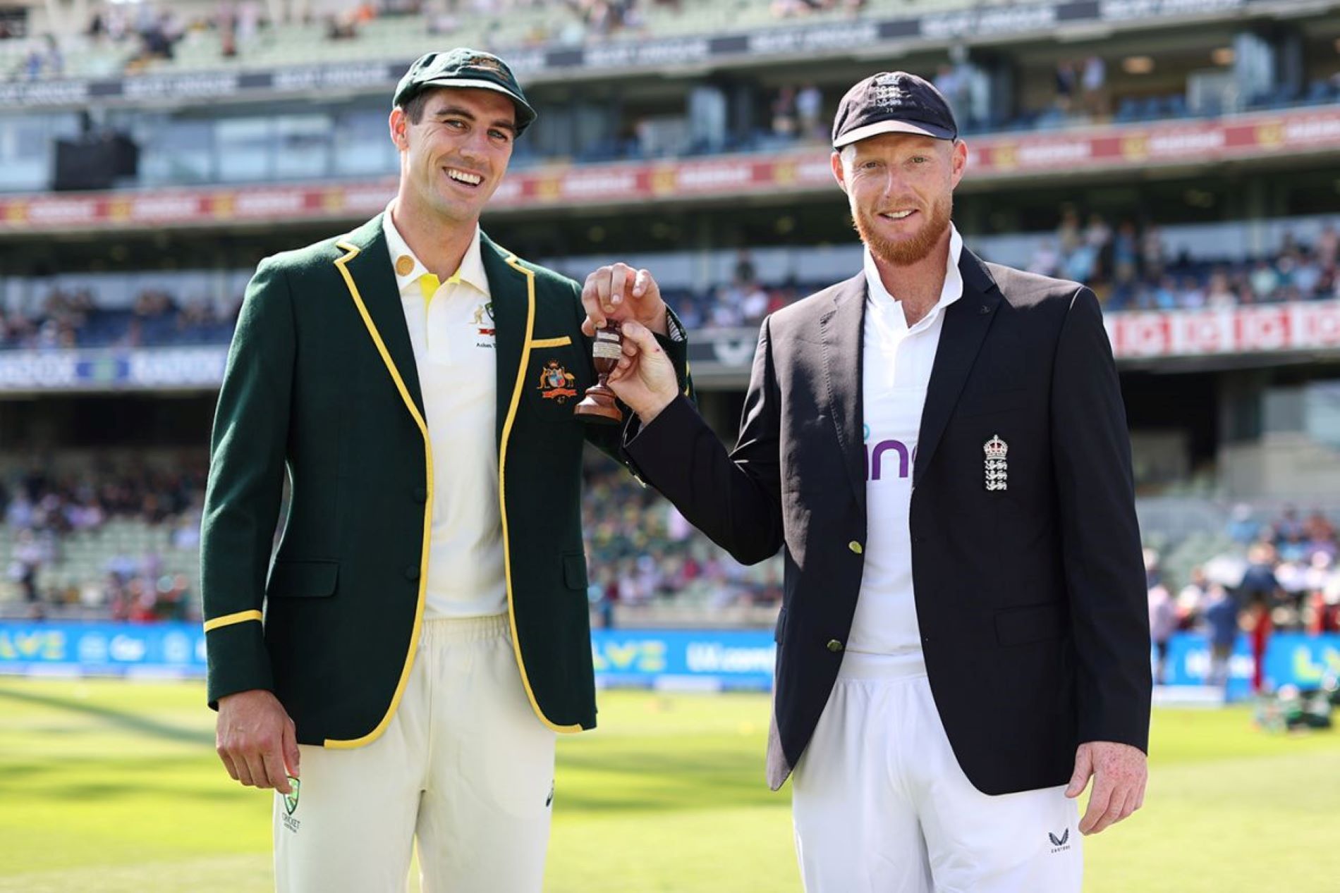 Pat Cummins and Ben Stokes pose with the Ashes urn ahead of the first Ashes Test