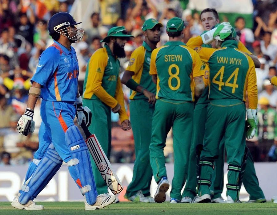 Sachin Tendulkar walks back after a brilliant century against South Africa.