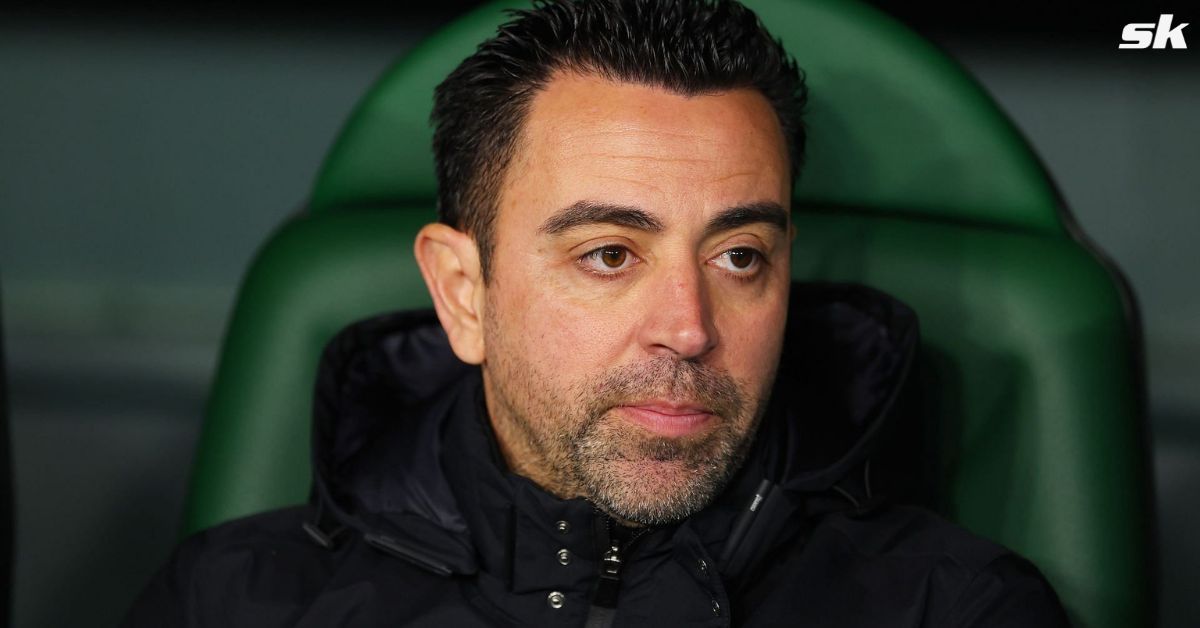 Barcelona manager Xavi Hernandez looks on.