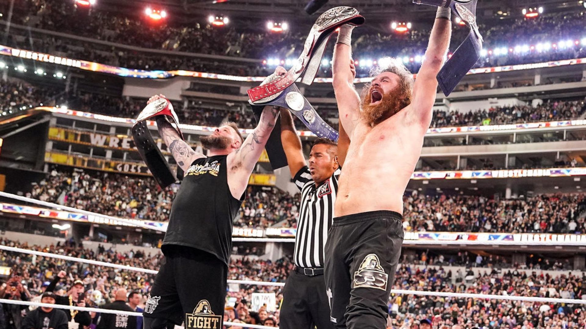 Kevin Owens and Sami Zayn celebrate their victory. Image Credits: wwe.com