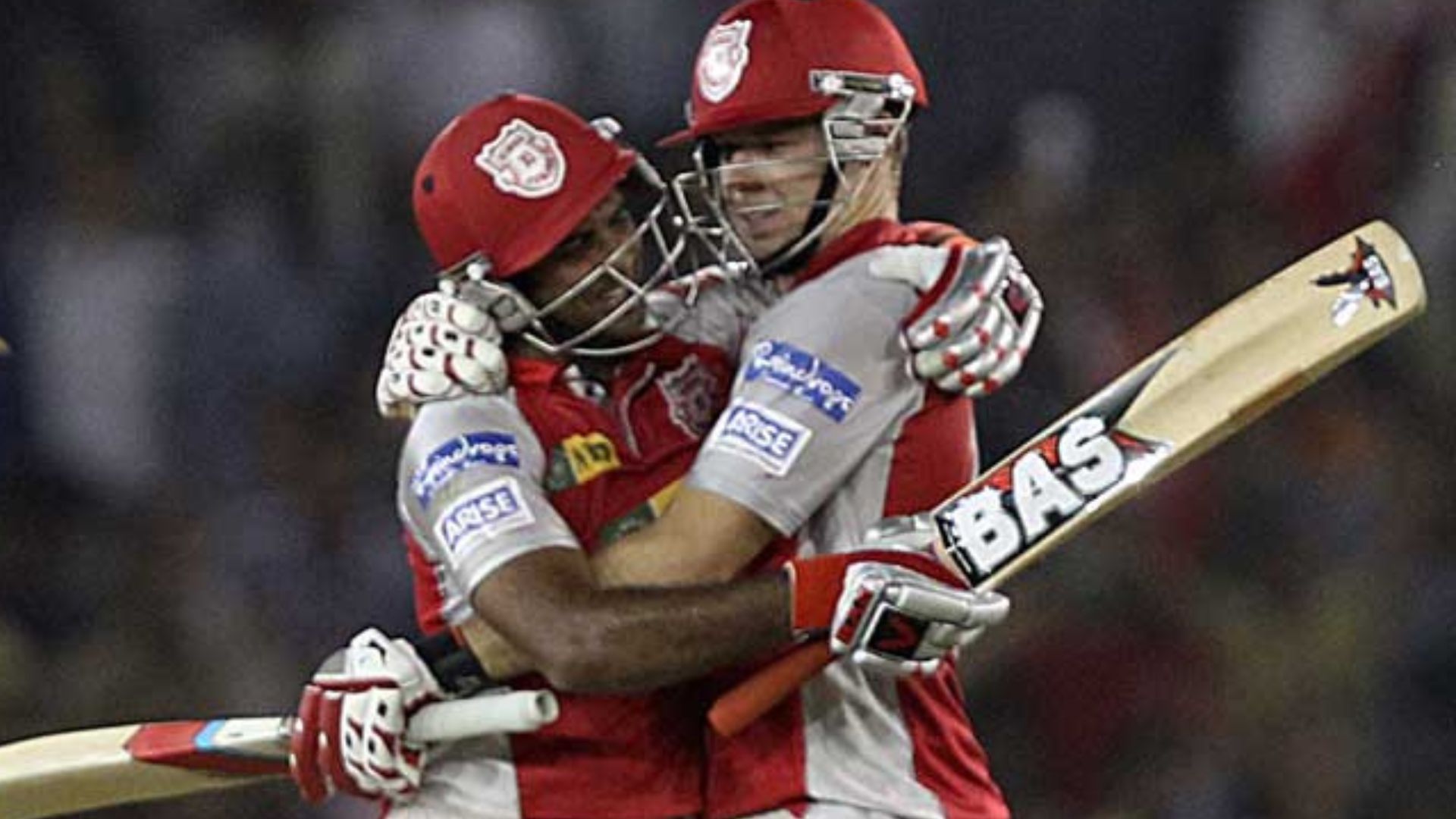 Miller celebrates with Rajagopal Satish after an incredible win against RCB in 2013.