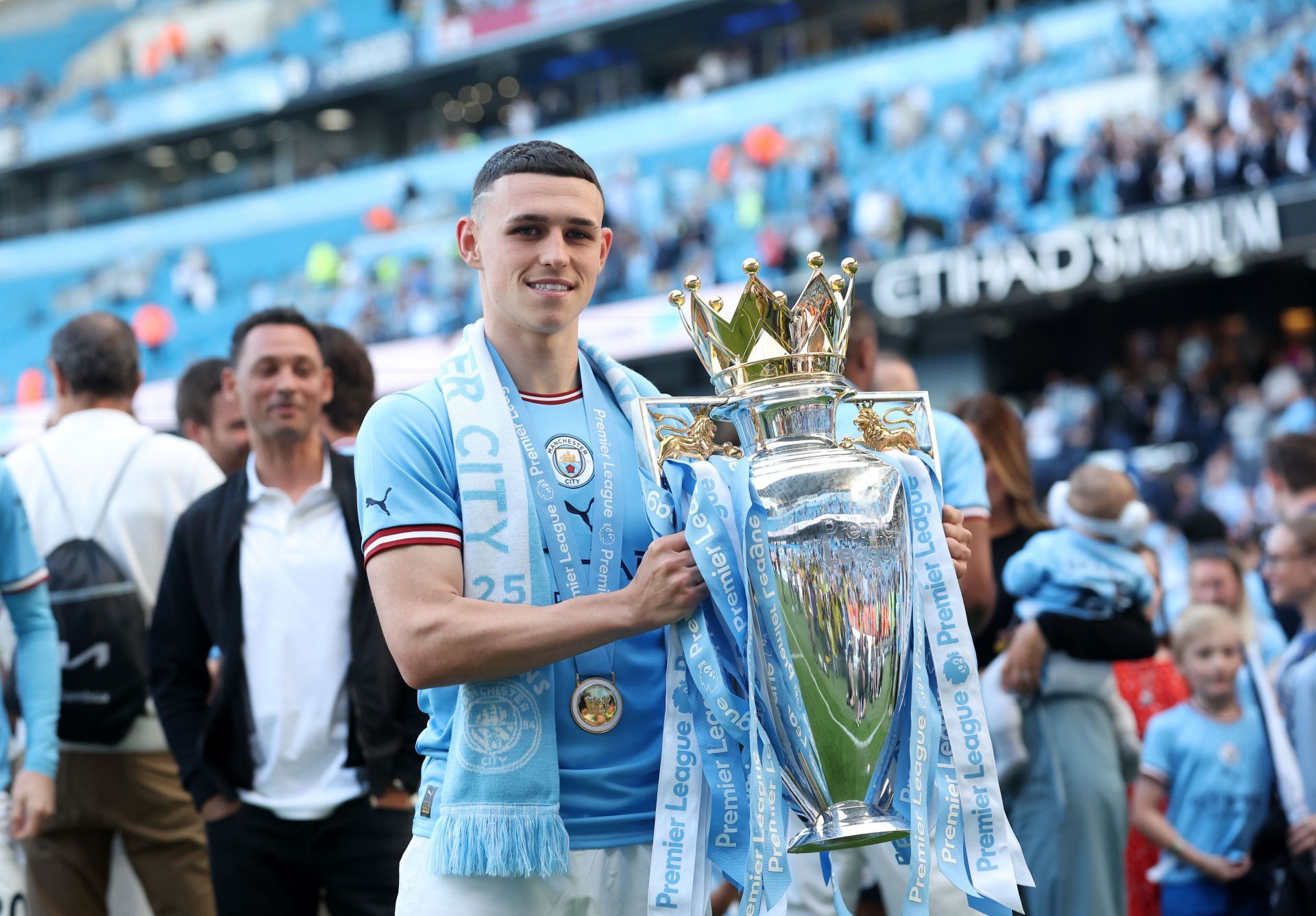 Phil Foden holding yet another trophy