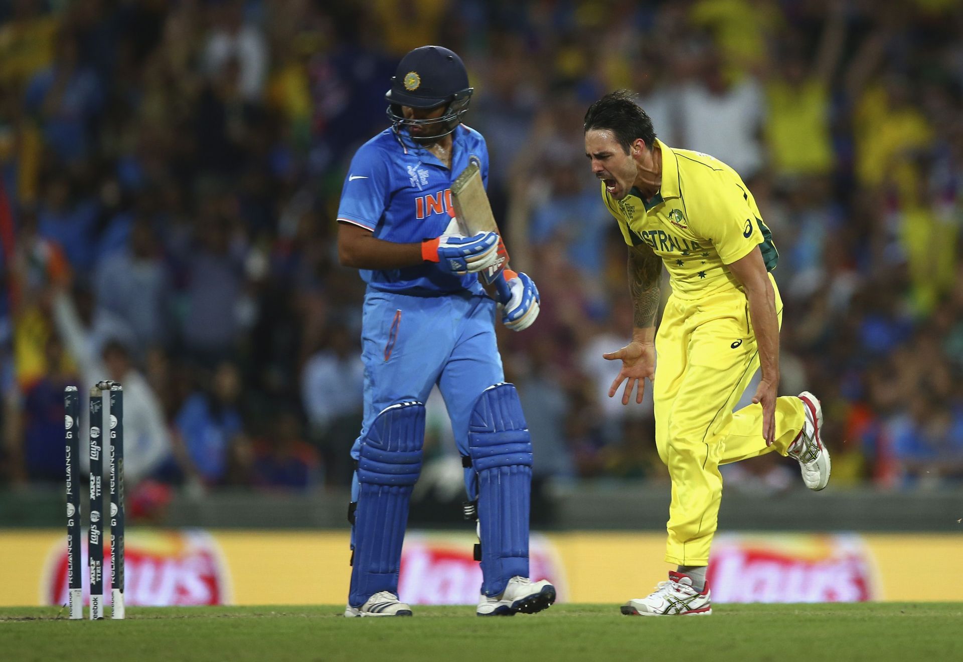 Mitchell Johnson celebrates Rohit Sharma&#039;s wicket in the 2015 ODI World Cup semi-final. (PC: Getty)