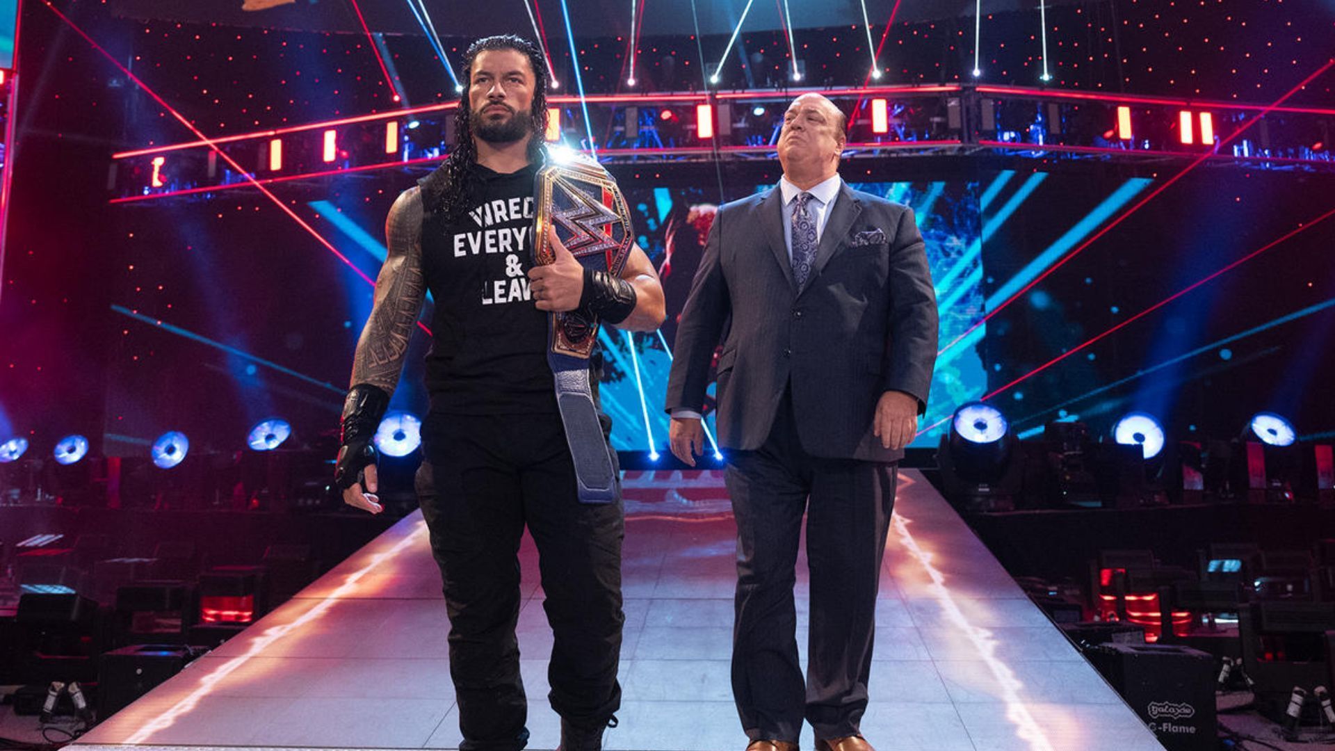 Roman Reigns making his entrance with Paul Heyman. Image Credits: wwe.com