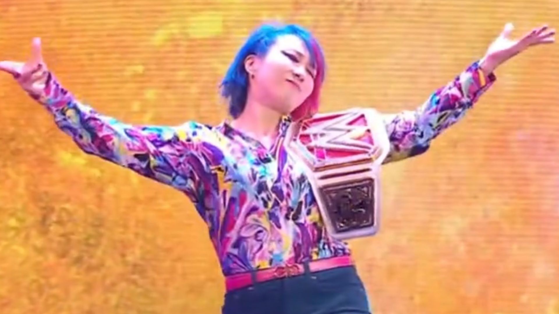 Asuka makes her entrance on WWE SmackDown.