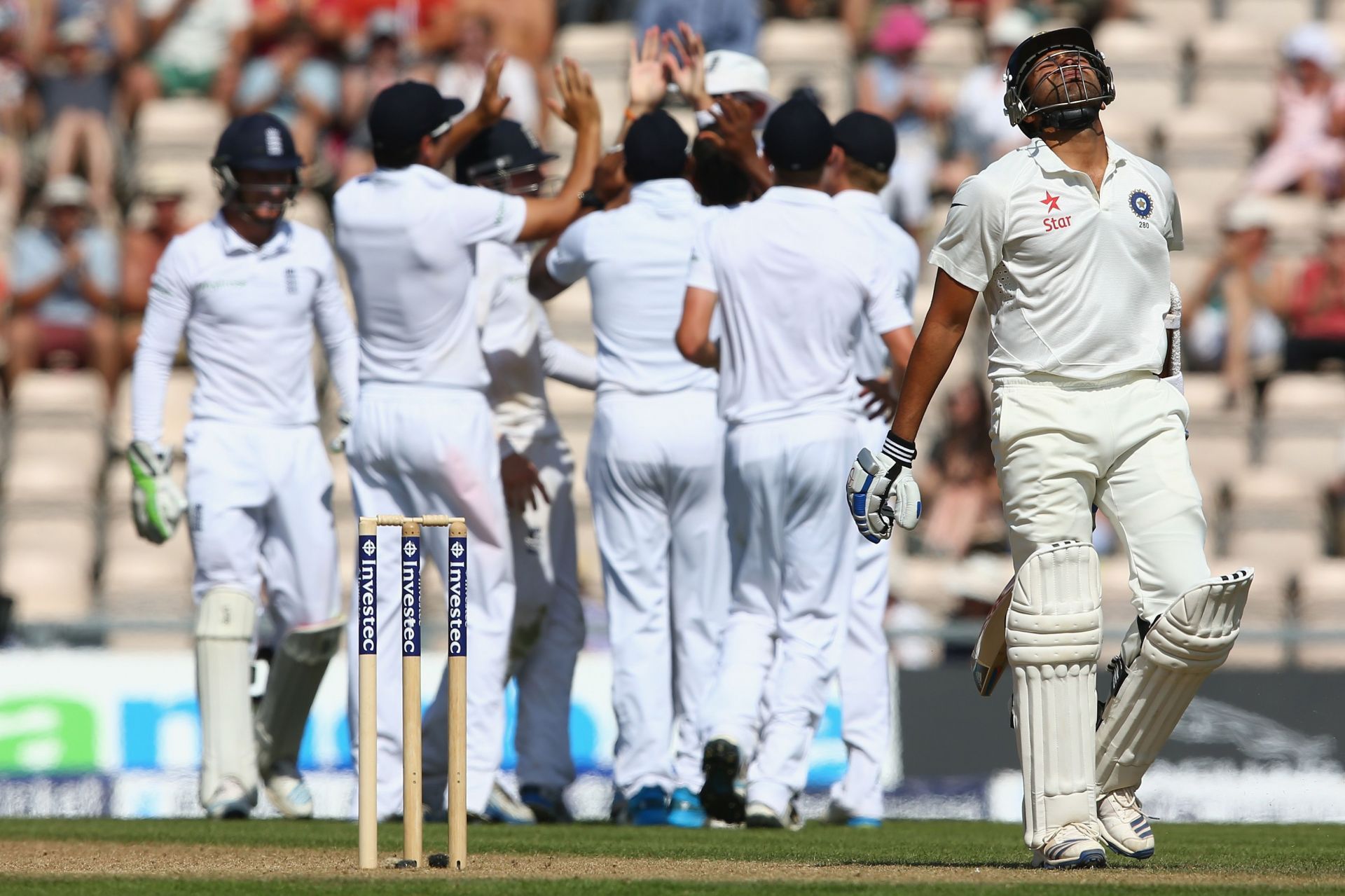 Rohit Sharma (R) was understandably dejected after throwing it away against England in Southampton in 2014.