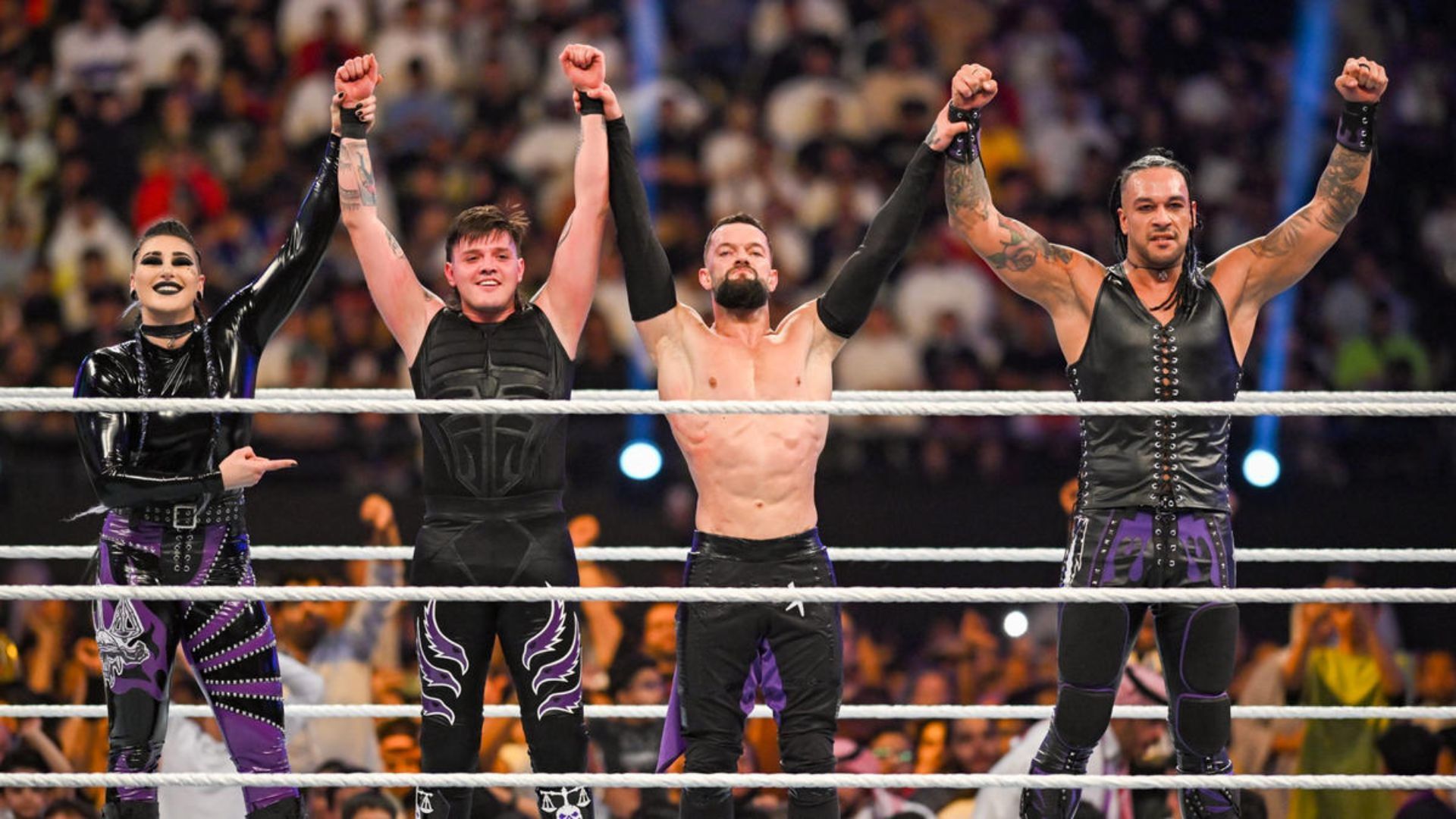 The Judgment Day celebrating a win against The O.C. Image Credits: wwe.com 