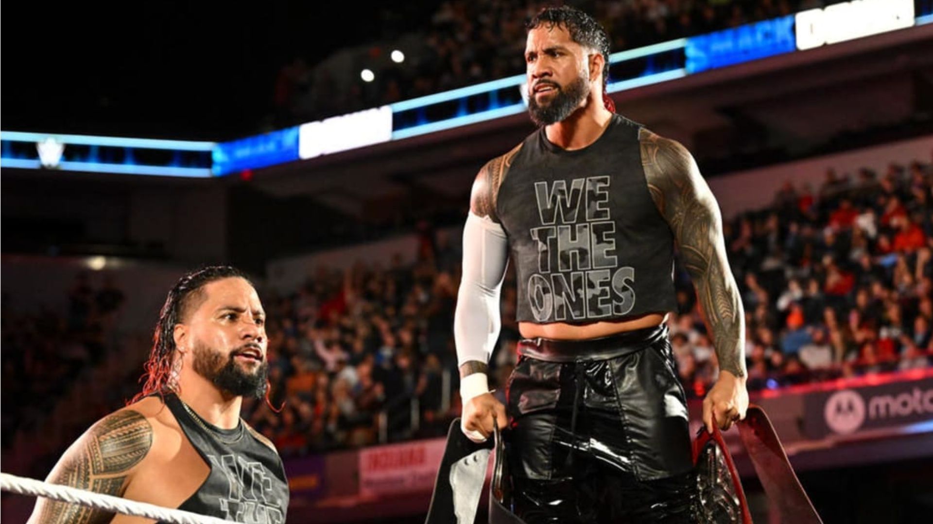 The Usos during a match on WWE SmackDown.