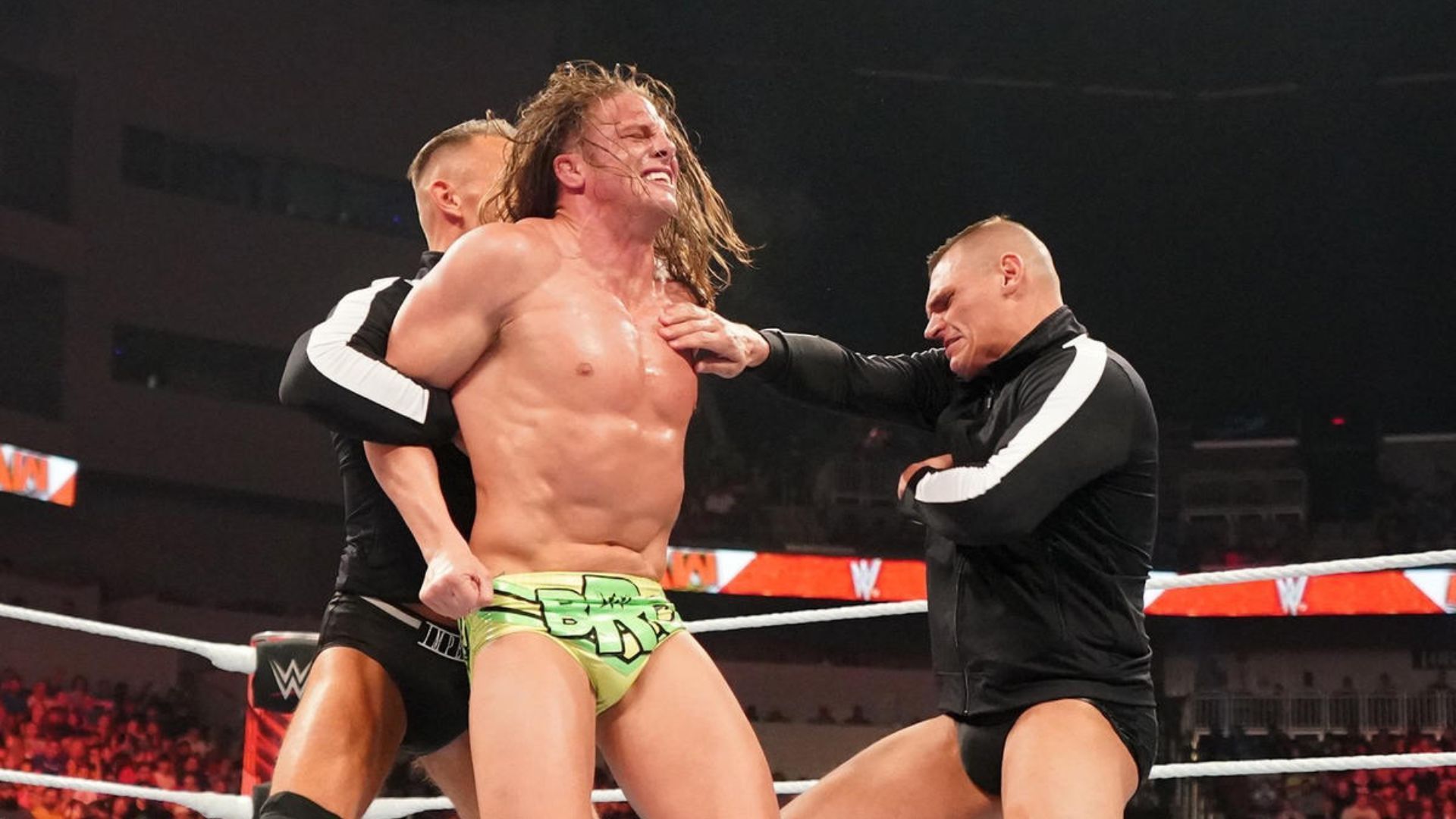 Gunther and Ludwig Kaiser attacking Matt Riddle. Image Credits: wwe.com