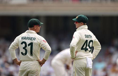 David Warner speaking to Steve Smith. (Credits: Getty)