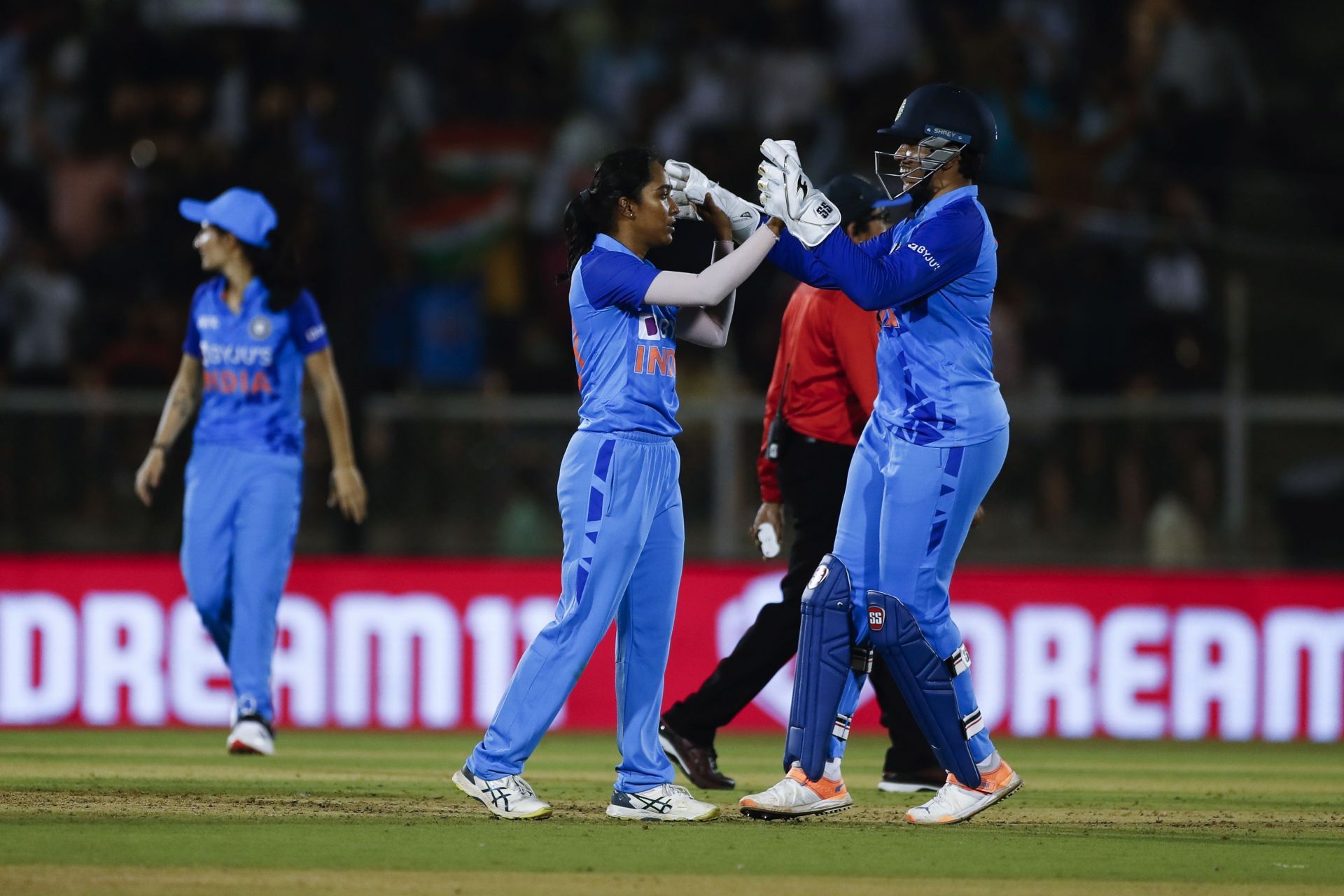 Anjali Sarvani (left) celebrates a wicket. (Pic: Getty Images)