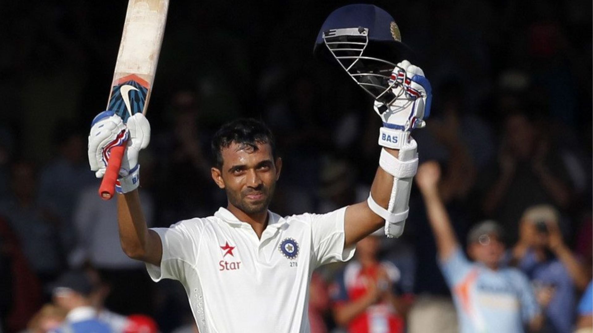 Rahane raises his bat after scoring a magnificent century