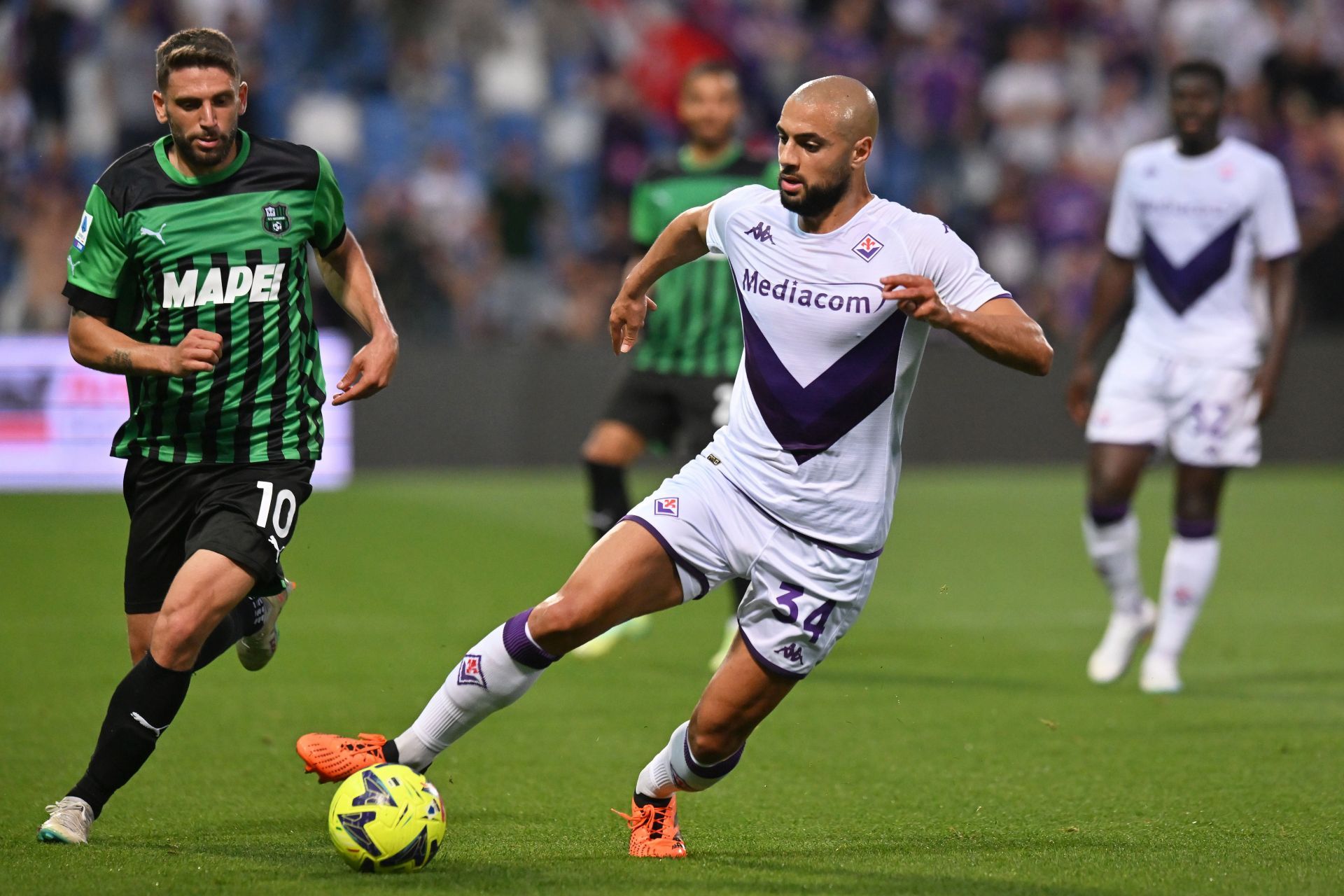 Sofyan Amrabat (right) is wanted at Old Trafford/