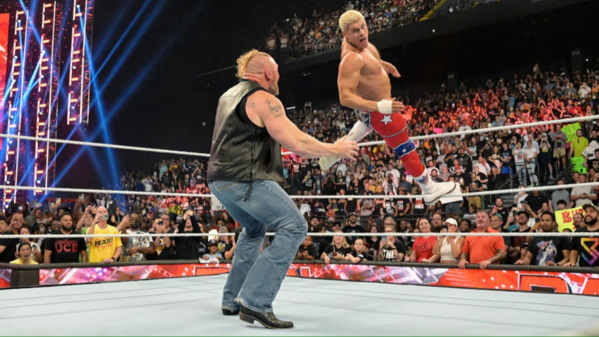 Cody Rhodes attempts his signature Cody Cutter on Brock Lesnar.