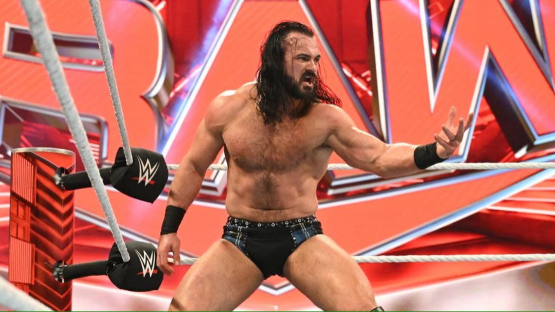 Drew McIntyre prepares for a claymore on WWE RAW.