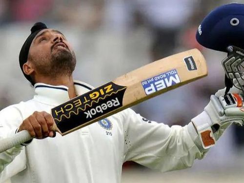 Harbhajan celebrates after notching up his maiden international century