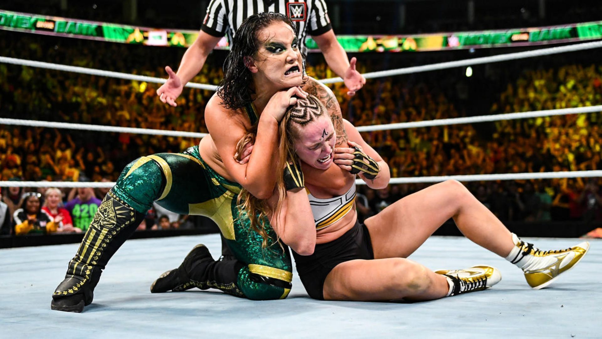 Shayna Baszler attacking Ronda Rousey. Image Credits: wwe.com 