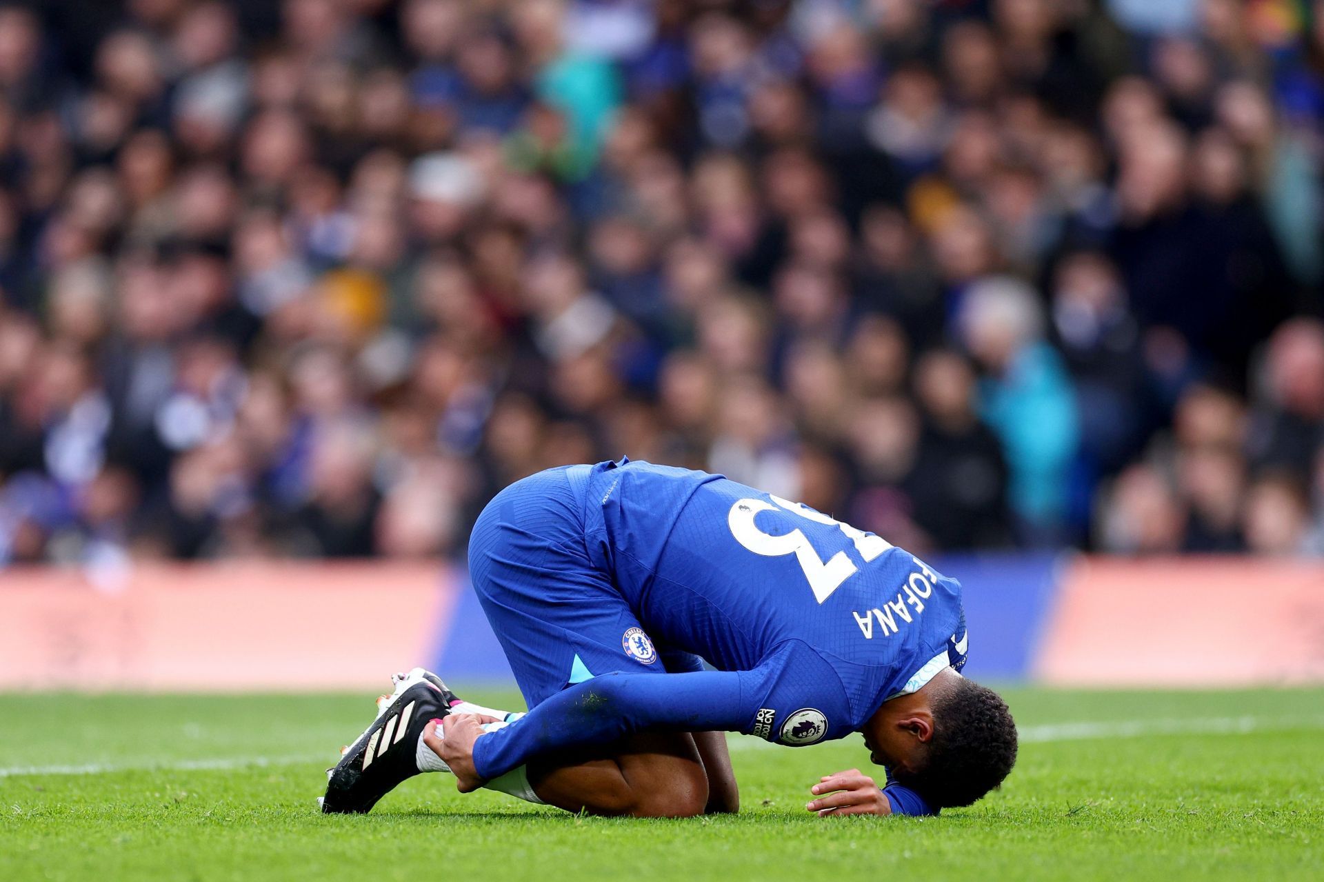 Wesley Fofana wriths in pain