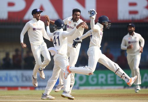 The off-spinner celebrates a wicket with teammates. (Pic: Getty Images)