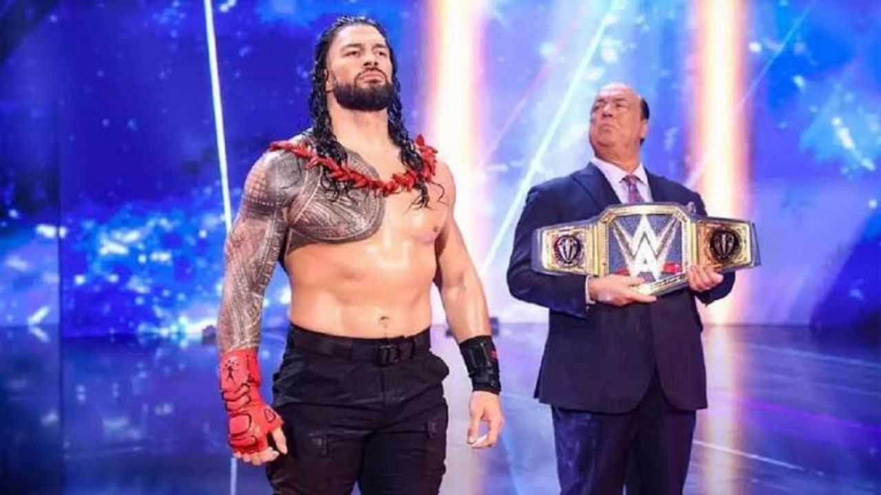 अनडिस्प्यूटेड WWE यूनिवर्सल चैंपियन रोमन रेंस और पॉल हेमन  