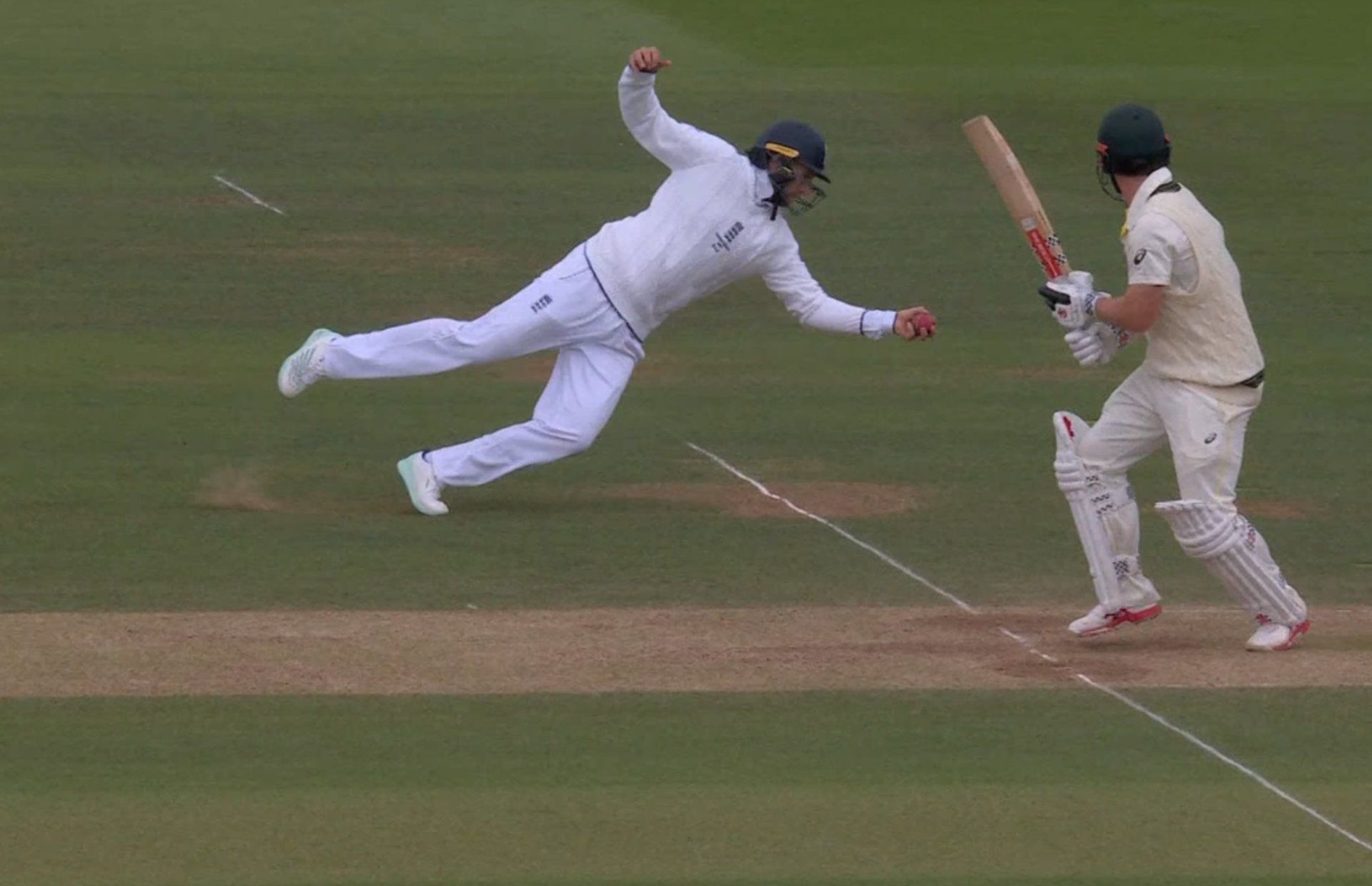 Joe Root takes the catch as Travis Head watches on. (Credits: Twitter)