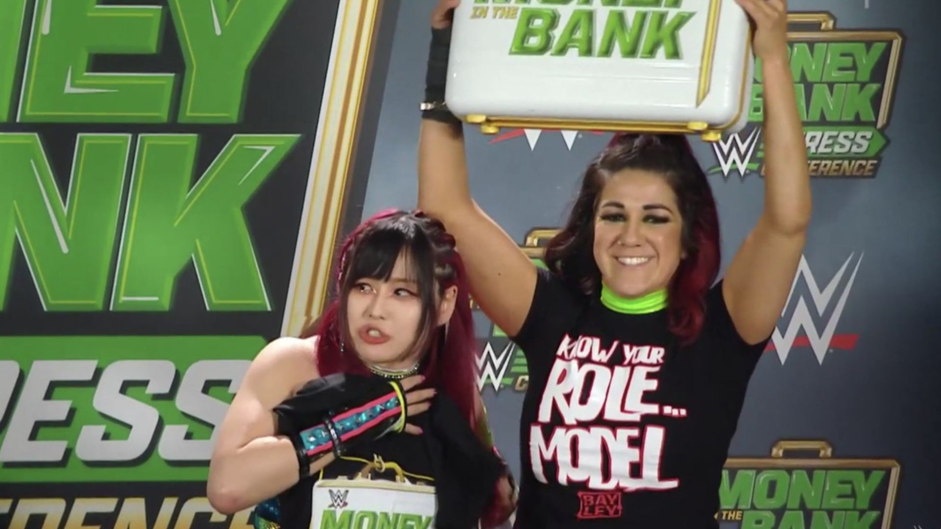 Bayley and IYO SKY at the Money in the Bank press conference.