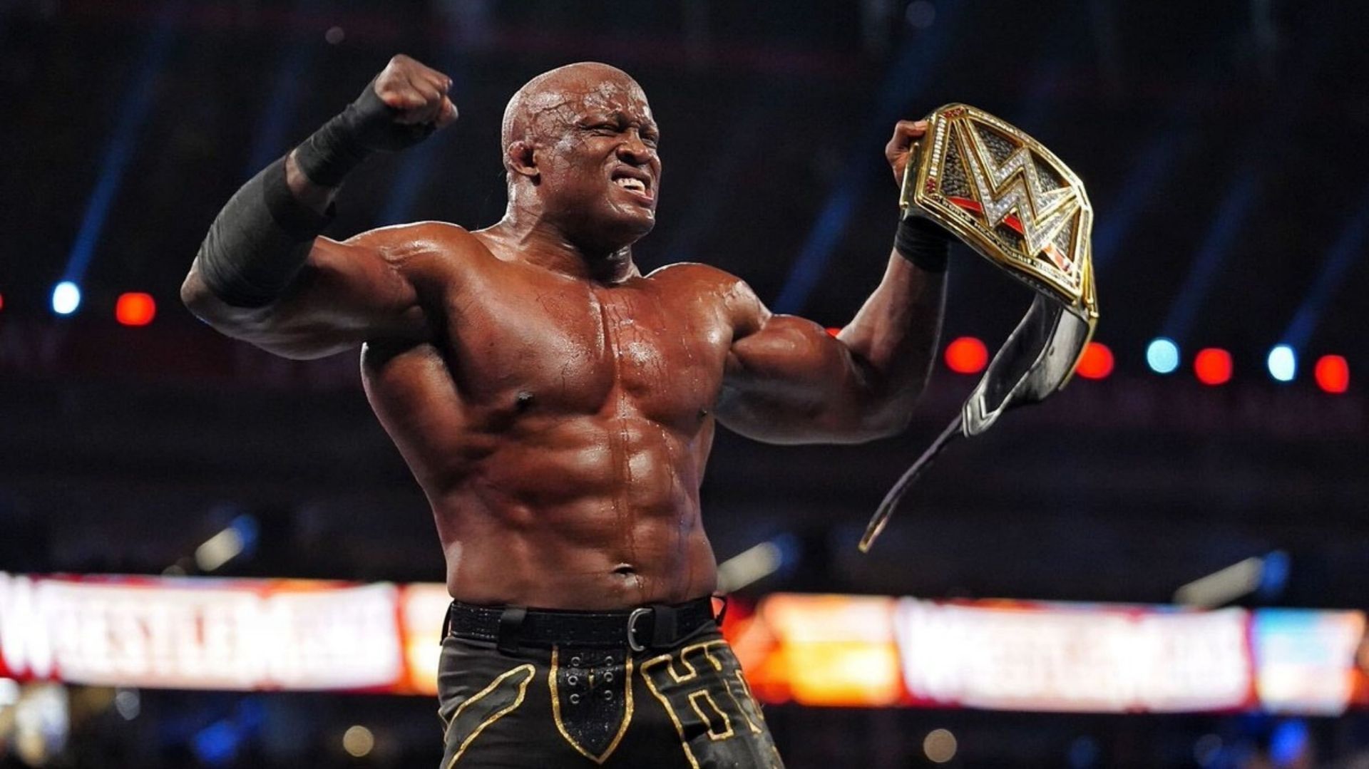 Bobby Lashley celebrates with the WWE Championship