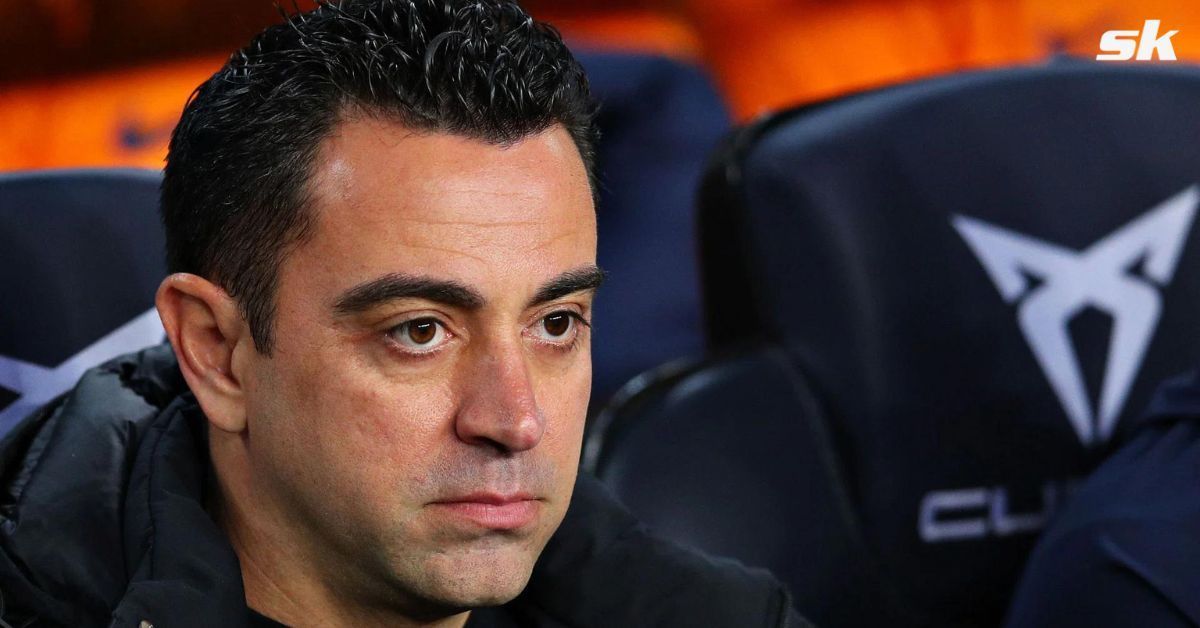 Barcelona manager Xavi Hernandez looks on.