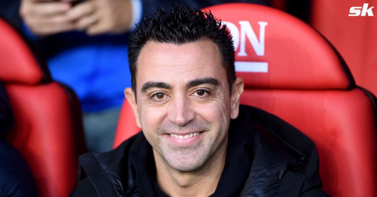 Barcelona manager Xavi Hernandez looks on.