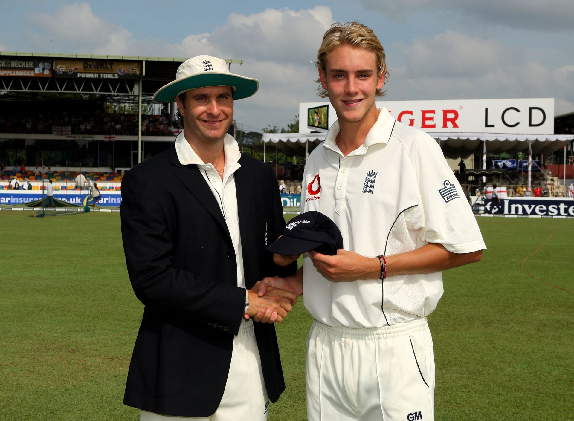 Michael Vaughan giving the Test cap to Stuart Broad [Getty Images]