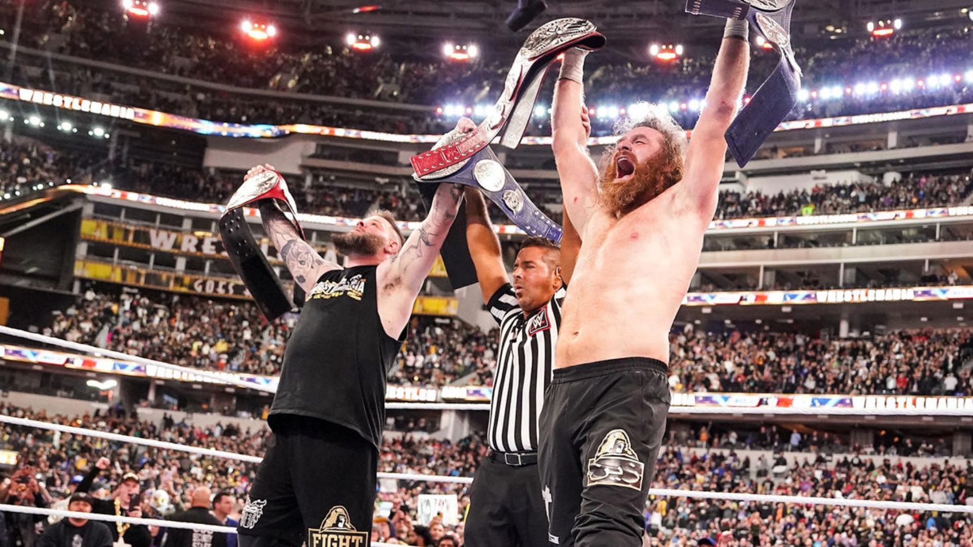 Kevin Owens and Sami Zayn celebrating. Image Credits: wwe.com 